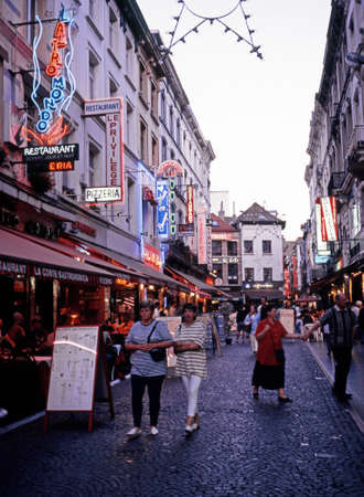 Pavement cafes along the Gal du Centre Main eating area in the City Centre at dusk Brussels Belgium Western Europe.のeditorial素材