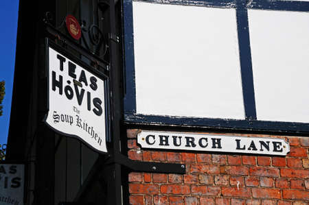 Tea with Hovis Soup Kitchen sign on a wall along Church Lane Stafford Staffordshire England UK Western Europe.のeditorial素材