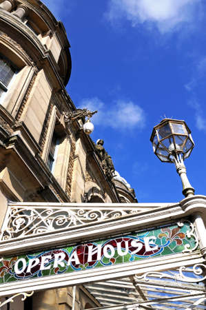 Stained glass name in a wrought iron frame on the front of the Opera House, Buxton, Derbyshire, England, UK, Western Europe.のeditorial素材