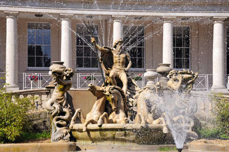 Neptune fountain outside the Municipal offices along the Promenade, Cheltenham, Gloucestershire, England, UK, Western Europe.のeditorial素材