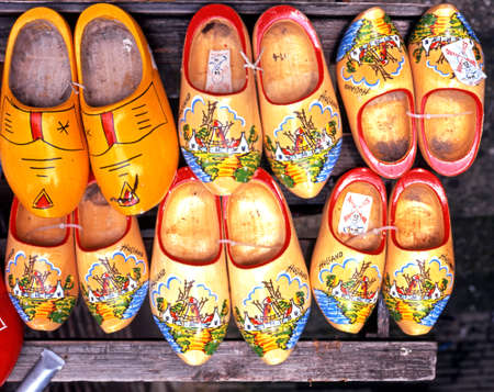 Painted clogs for sale outside a city centre shop, Amsterdam, Holland, Netherlands, Europe.のeditorial素材