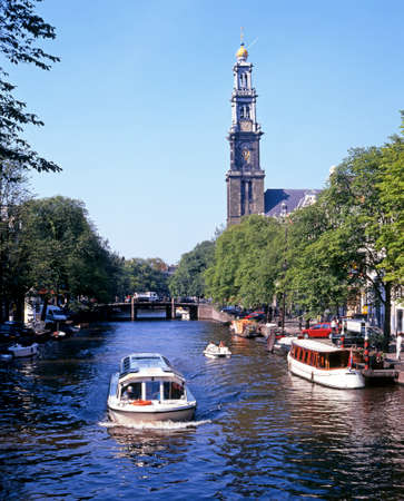 Boats on the Prinsengracht with the Westerkerk to rear, Amsterdam, Holland, Netherlands, Europe.のeditorial素材