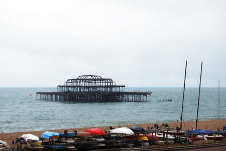 Remains of West Pier which was closed in 1975 and subsequently damaged by fire and storms with part...