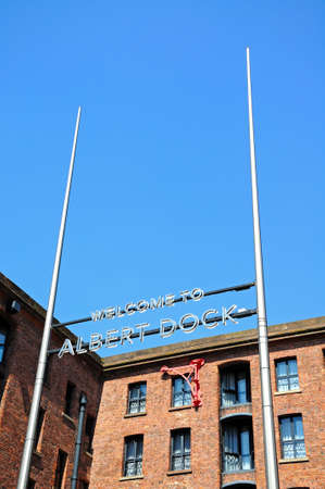Welcome to Albert Dock sign outside the Brittania Pavilion, Liverpool, Merseyside, England, UK, Western Europe.のeditorial素材