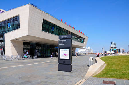 The Ferry Building at Pier Head with a cruise liner to the rear, Liverpool, Merseyside, England, UK,...