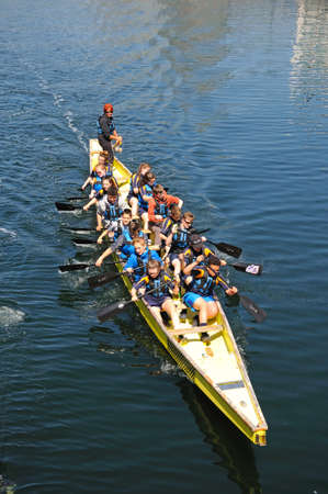 Children rowing in Salthouse Dock, Liverpool, Merseyside, England, UK, Western Europe.