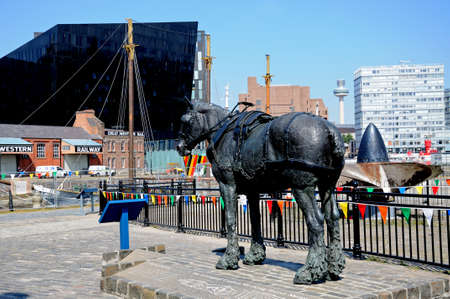 Waiting statue by Judy Boyt in Canning Dock, Liverpool, Merseyside, England, UK, Western Europe.のeditorial素材