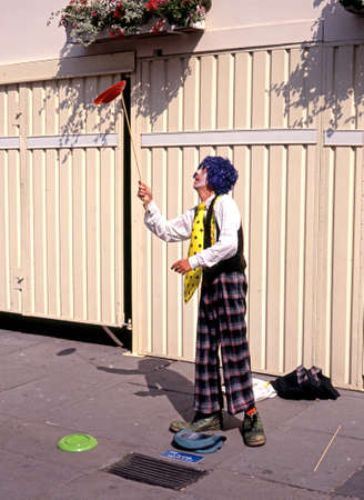 Plate spinner performing in the street, Bath, Avon, England, UK, Western Europe.のeditorial素材