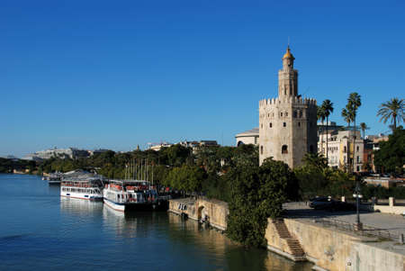 Golden tower Torre del Oro along the Guadalquivir river, Seville, Seville Province, Andalusia, Spain, Western Europe.の写真素材