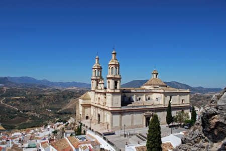 Elevated view of the town and Church Parish of Our Lady of the Incarnation, Olvera, Cadiz Province, Andalusia, Spain, Western Europe.の写真素材