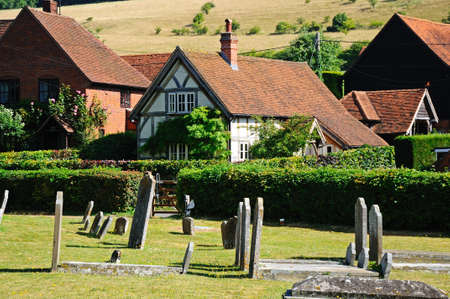 St Mary the Virgin churchyard with village cottages to the rear, Turville, Buckinghamshire, England, UK, Western Europe.のeditorial素材