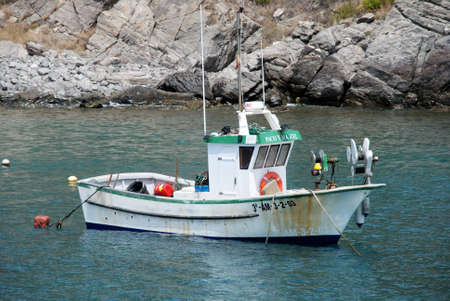 Traditional Spanish fishing boat in the harbour mouth, Marina del Este, Malaga Province, Andalusia, Spain, Western Europe.のeditorial素材