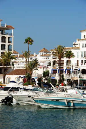 Yachts and boats in the marina surrounded by apartments and restaurants, Puerto Duquesa, Malaga Province, Andalucia, Spain, Western Europe.のeditorial素材