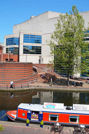 View towards the rear of the ICC with a narrowboat cafe on the canal in the foreground at Brindleyplace Birmingham, England, UK, Western Europe.のeditorial素材