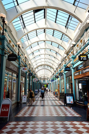 Shoppers walking through the Burlington Arcade, Birmingham, England, UK, Western Europe.