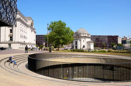 View of the Hall of Memory with Baskerville House to the left hand side in Centenary Square, Birmingham, England, UK, Western Europe.のeditorial素材