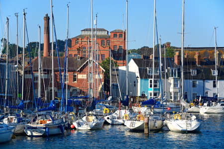 Yachts in the harbour with Brewers Quay buildings to the rear, Weymouth, Dorset, England, UK, Western Europe.のeditorial素材