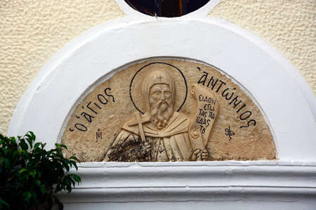 Monk sculpture on the wall of St Anthonys church, Rethymno, Crete, Greece, Europe.の写真素材