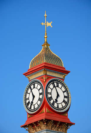 Top part of the Queen Victoria Jubilee clock tower along the Esplanade promenade, Weymouth, Dorset, England, UK, Western Europe.のeditorial素材