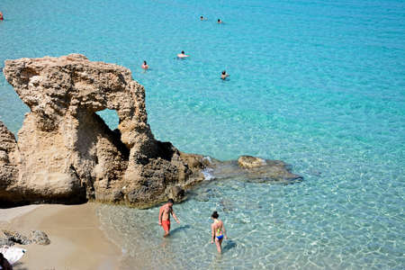 Tourists relaxing on the beach, Istro, Crete, Greece, Europe.のeditorial素材