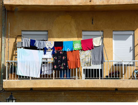 Washing drying on an apartment balcony, Ierapetra, Crete, Greece, Europe.のeditorial素材