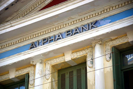 Greek Alpha Bank building along 25is Avgoustou, Heraklion, Crete, Greece, Europe.のeditorial素材