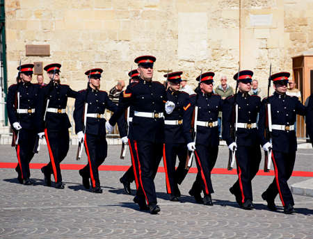 Military parade after the arrival of political dignitaries for the EPP European Peoples party congress outside the Auberge de Castille (office of the Prime Minister) in Castille Square, Valletta, Malta, Europe.のeditorial素材