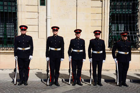 Uniformed soldiers on parade outside the Auberge de Castille for a European Union conference in...