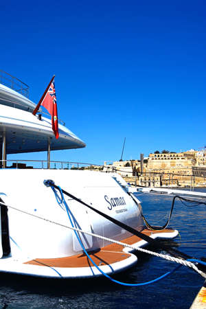 Luxury yacht moored in the marina with views towards Valletta waterfront, Vittoriosa, Malta, Europe.のeditorial素材