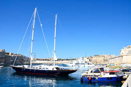View of yachts moored in the marina with views towards Senglea to the left, Vittoriosa to the right and Valletta to the rear, Vittoriosa, Malta, Europe.のeditorial素材