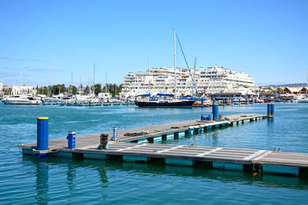 View of yachts in the marina with buildings to the rear, Vilamoura, Algarve, Portugal, Europe.のeditorial素材