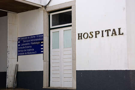 Hospital door entrance with information signs, Lagos, Algarve, Portugal, Europe.のeditorial素材