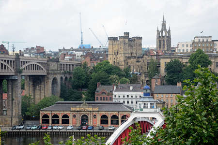 View across the River Tyne towards Newcastle upon Tyne with the medieval castle and St Nicholas...