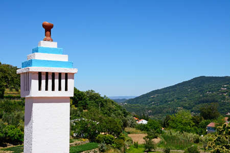 Traditional Portuese chimney with views across the Monchique mountains, Monchique, Algarve, Portugal, Europe.の写真素材