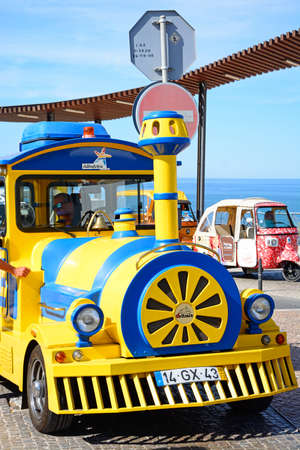 Tourist land train parked at the Miradouro do Pau da Bandeira, Albufeira, Portugal, Europe.