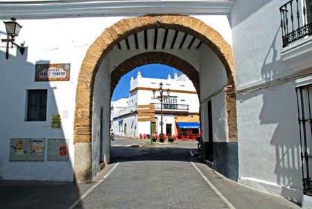 CONIL DE LA FRONTERA, SPAIN ï¿½ SEPTEMBER 14, 2008 - Town entrance arch seen from the Plaza de Espana in the old town, Conil de la Frontera, Cadiz Province, Andalusia, Spain, Europe, September 14, 2008.のeditorial素材