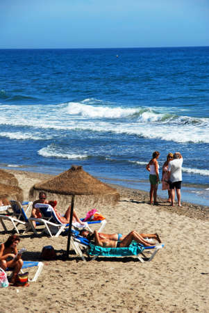 Elevated view of tourists relaxing on Playa de las Canas beach, Marbella, Malaga Province, Andalusia, Spain, Western Europe.のeditorial素材