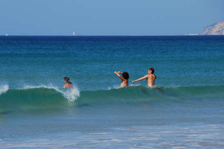 ZAHARA DE LOS ATUNES, SPAIN - SEPTEMBER 14, 2008 - Three women swimming in the sea, Zahara de los Atunes, Cadiz Province, Andalusia, Spain, Europe, September 14, 2008.のeditorial素材