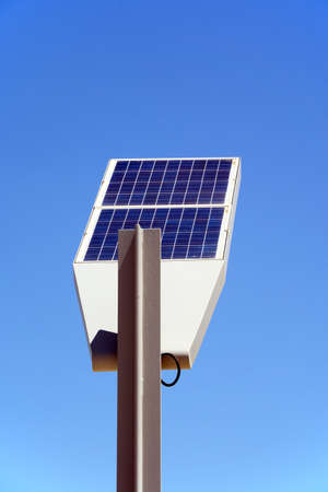 Rear of a solar powered streetlight against a blue sky, Vilamoura, Algarve, Portugal, Europe.