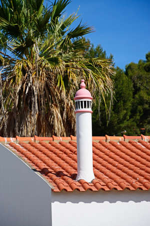 Traditional white Portuguese chimney, Albufeira, Algarve, Portugal, Europe.の写真素材