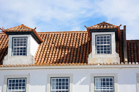 Traditional Portuguese building with dormer windows in the Praca do Marques de Pombal (Marquis of...