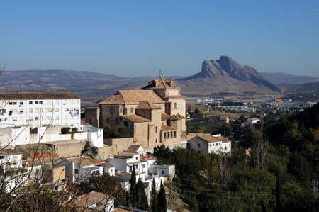 ANTEQUERA, SPAIN - NOVEMBER 11, 2009 - Carmen church and city rooftops with the Lovers Rock (Pena de los Enamorados) to the rear, Antequera, Malaga Province, Andalucia, Spain, Europe, November 11, 2009.のeditorial素材