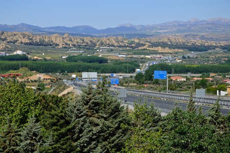 GUADIX, SPAIN - MAY 5, 2010 - Elevated view of the A92 Motorway and surrounding landscape, Guadix, Granada Province, Andalucia, Spain, Europe, May 5, 2010.のeditorial素材