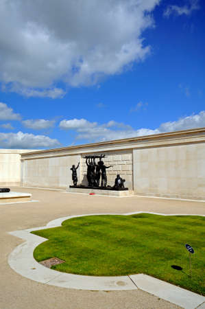 ALREWAS, UK - MAY 21, 2014 - Statues of soldiers with a stretcher in the inner circle of the Armed Forces Memorial, National Memorial Arboretum, Alrewas, Staffordshire, UK, May 21, 2014.のeditorial素材