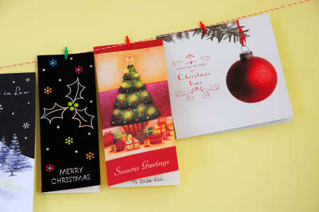 Christmas cards hanging on a string, Calahonda, Spain.のeditorial素材