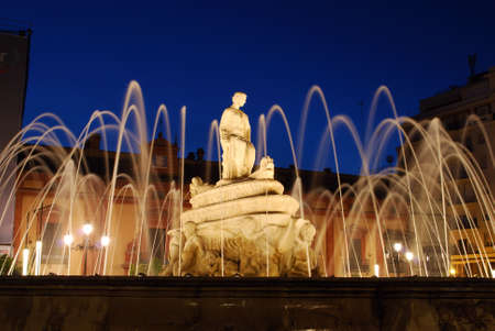 View of the Puerta de Jerez fountain illuminated at night, Seville, Spain.のeditorial素材