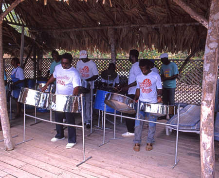 Steel band playing at the Grafton Beach Resort Hotel, Tobago, Trinidad and Tobago, Caribbean.のeditorial素材