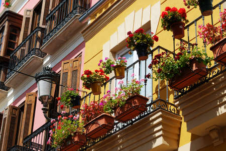 Townhouses with ornate balconies in the city centre, Malaga, Spain.のeditorial素材