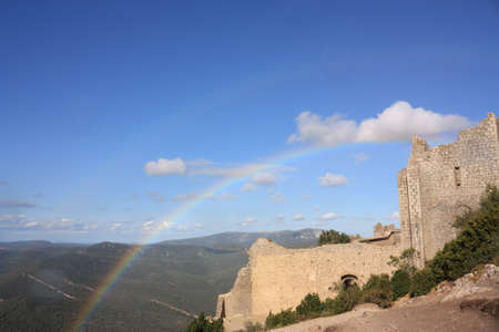 Rainbow on castle of Peyrepertuse in Corbieres, Franceの写真素材