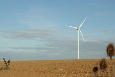 Plowed land and windmill in Picardie region of France